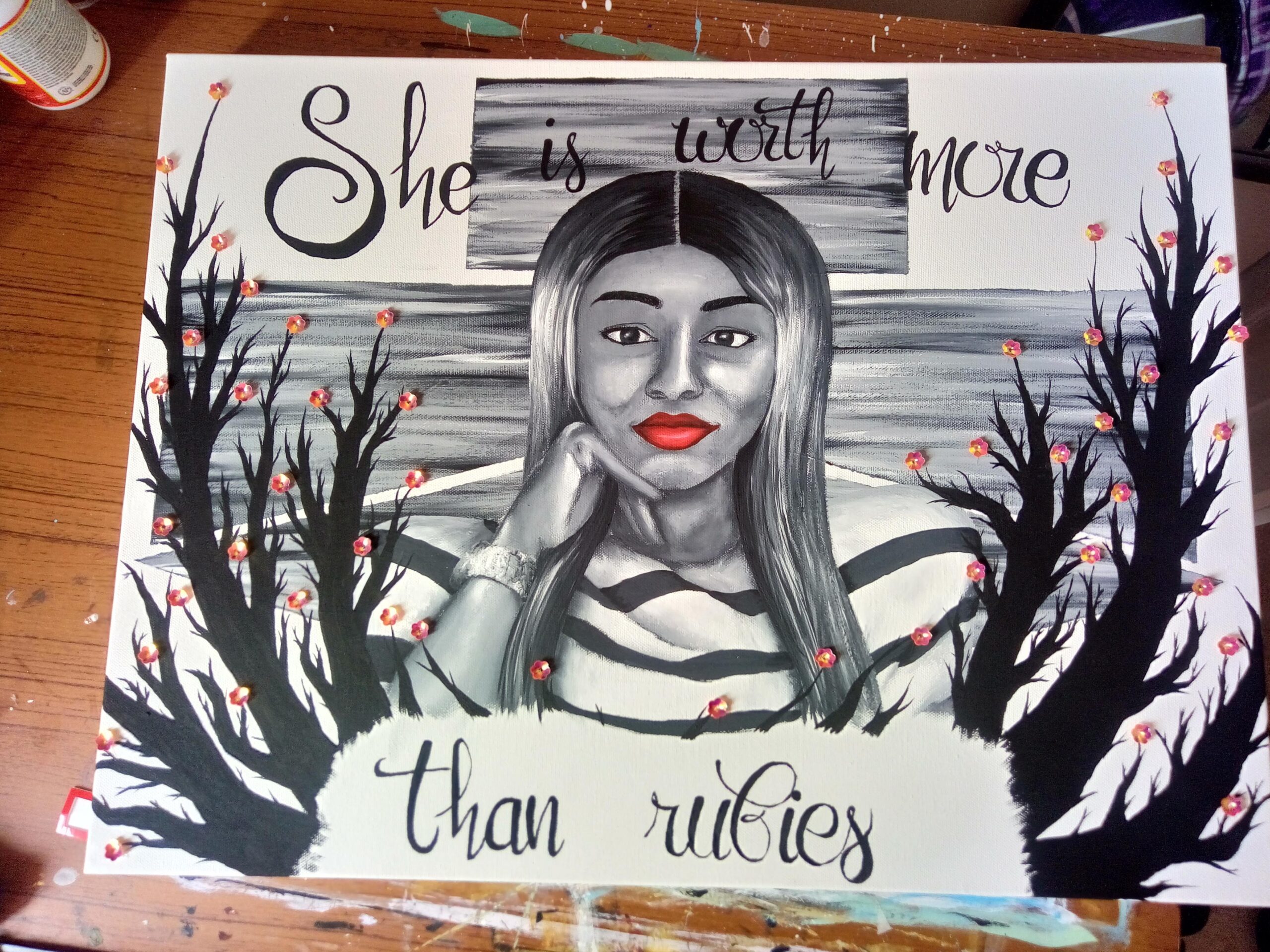 Image of a woman with branches behind her